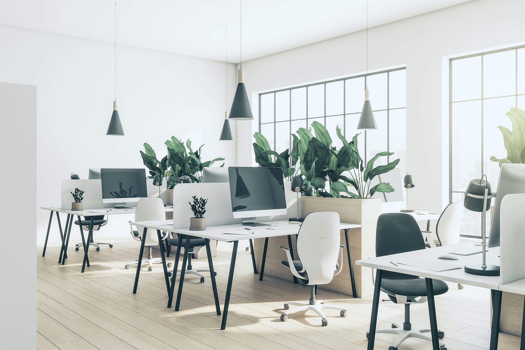 Eco style sunlit open space office with big flowerpots with green plants in the form of partition between cozy work places with modern computers, wooden floor and light walls background. 3D rendering